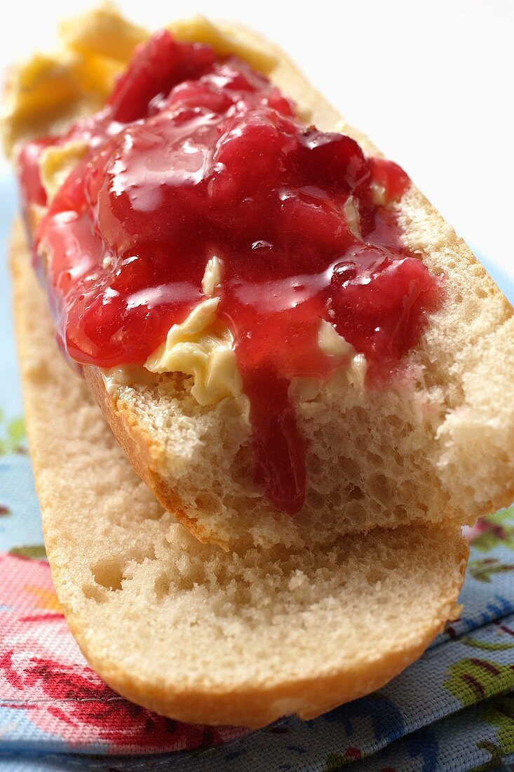 Baguette with butter and jam