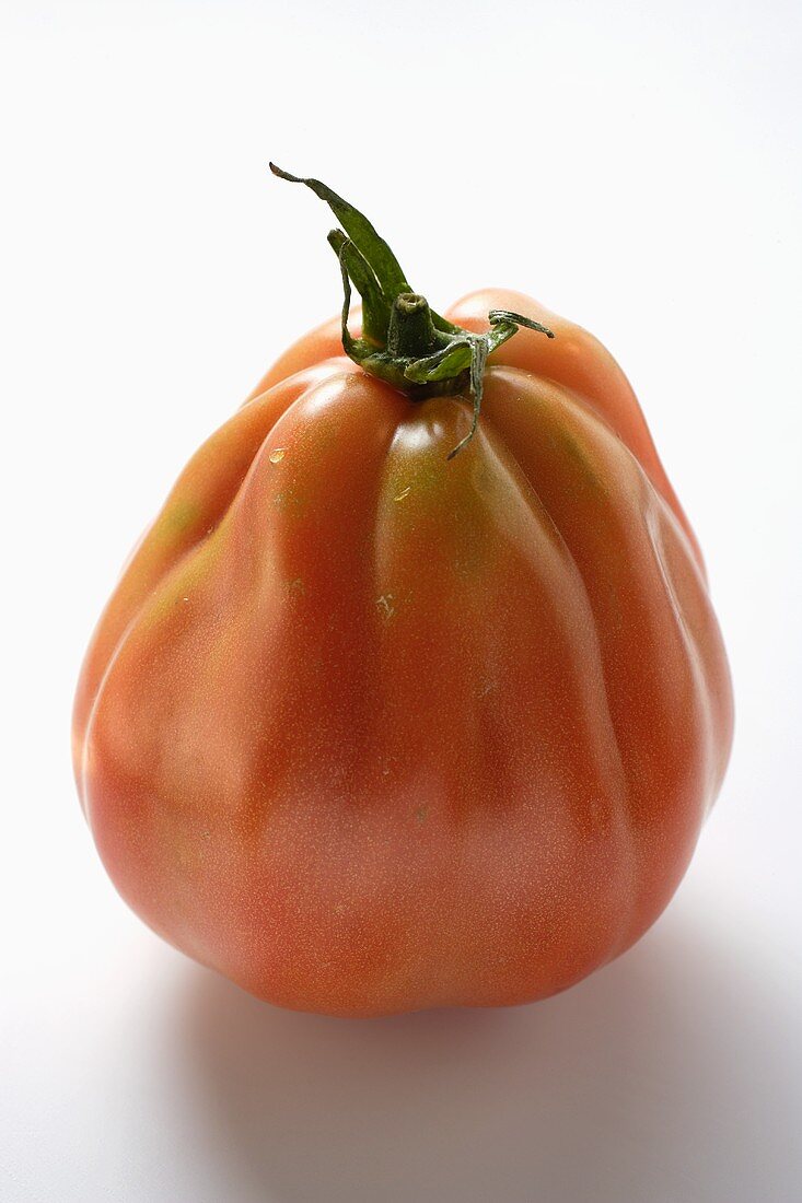 A tomato (standing on its end)