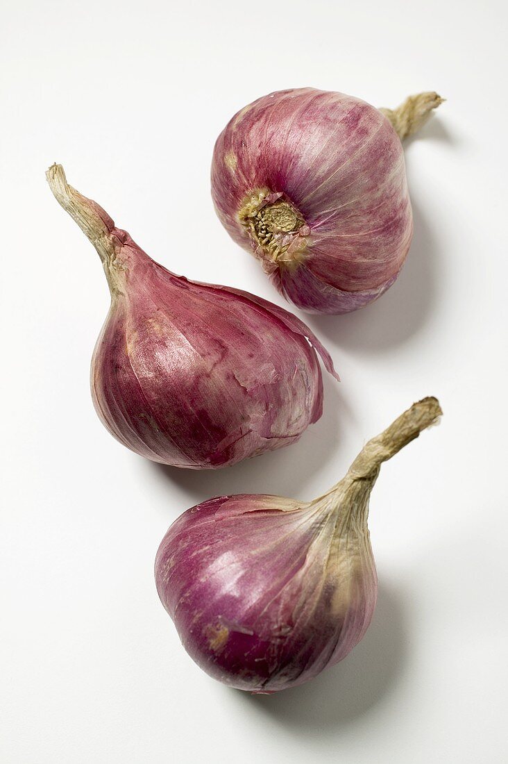 Three red onions