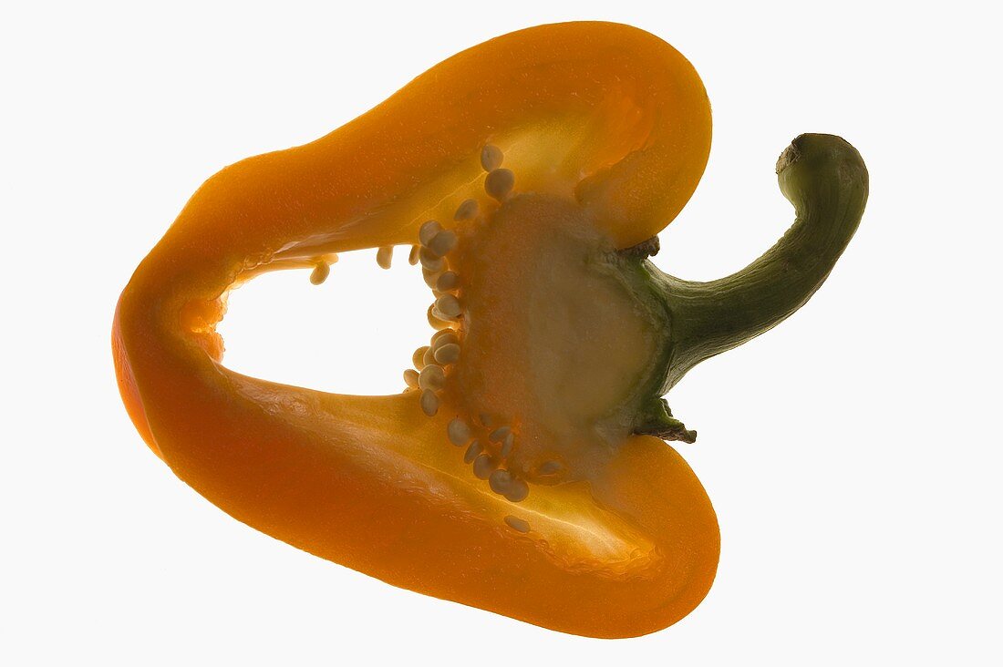 Yellow pepper (lengthwise slice), backlit
