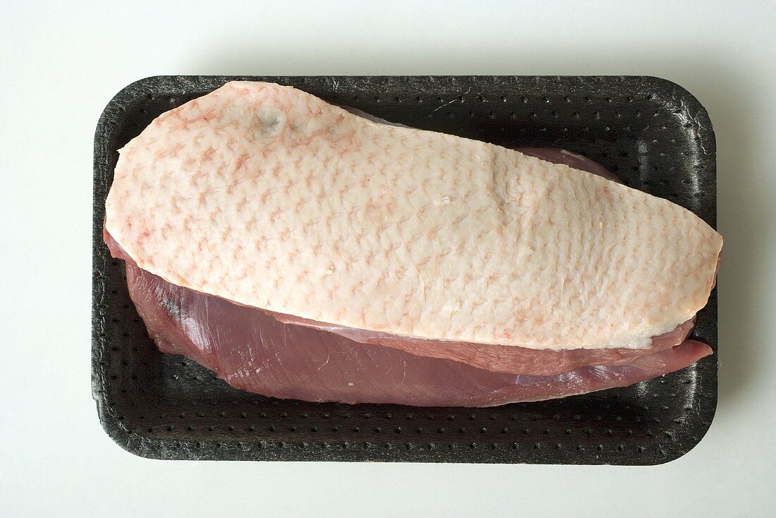 Duck breast in polystyrene tray