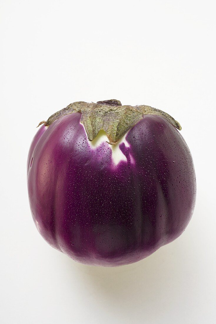 Purple Thai aubergine with drops of water