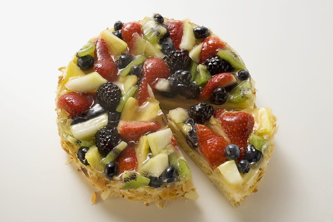 Fruit gateau, a piece cut