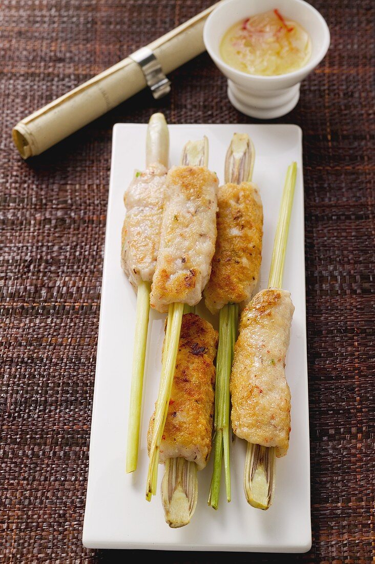 Marinated chicken kebabs on lemon grass stalks