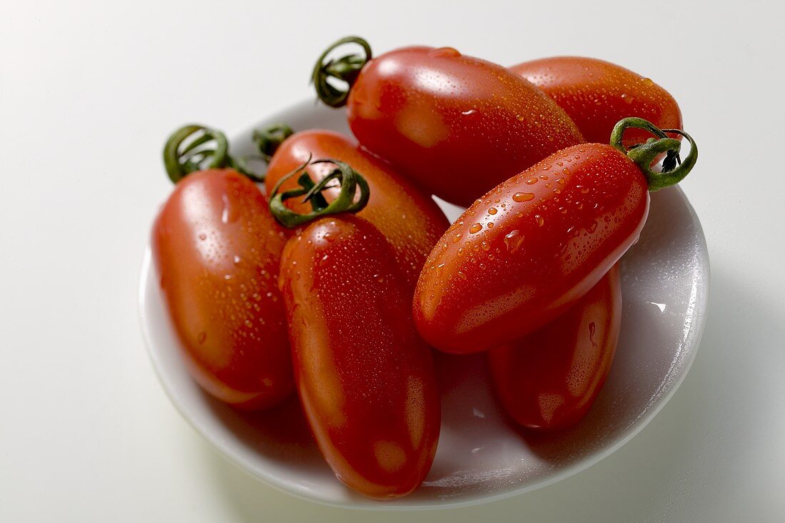 Fresh grape tomatoes on plate