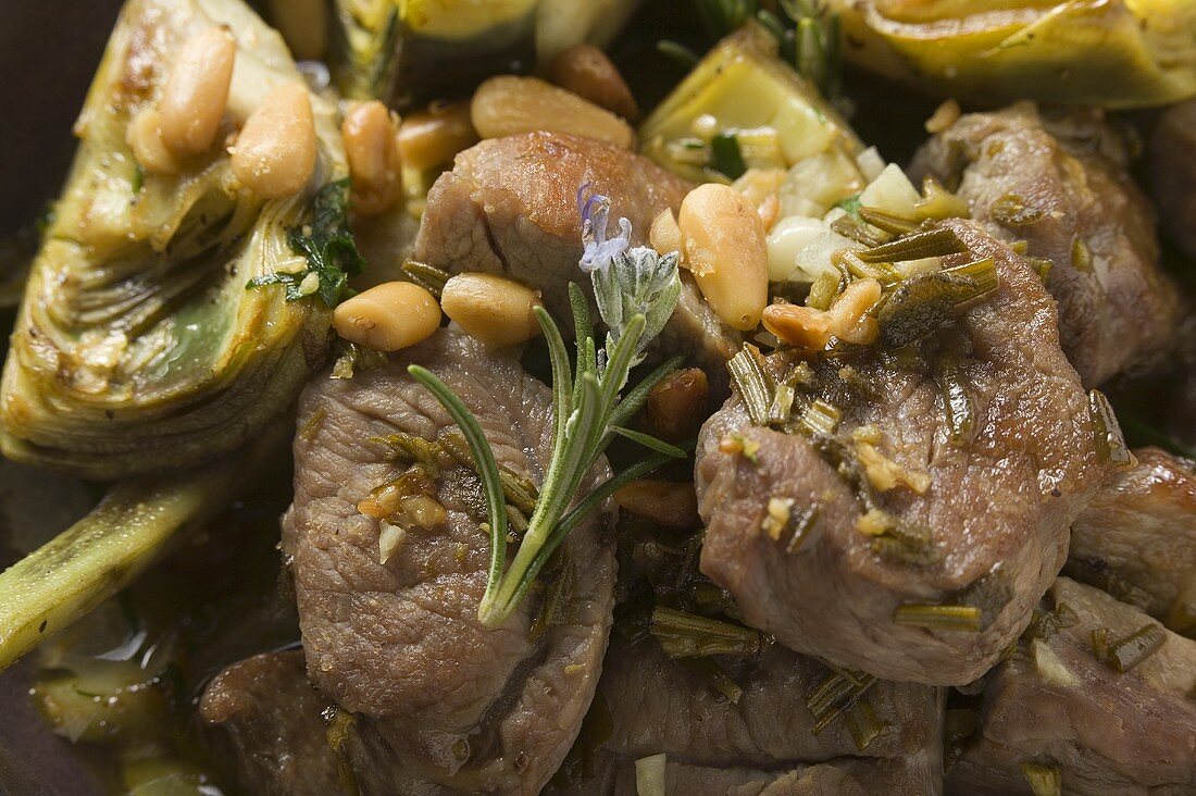 Lamb with artichokes, herbs and pine nuts