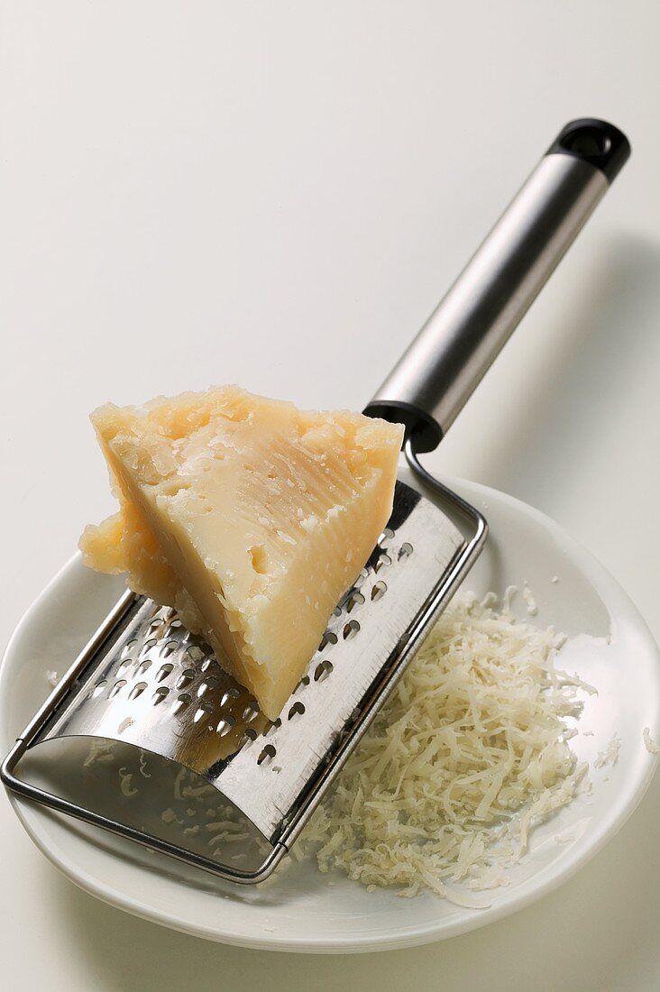 Piece of Pecorino with grater