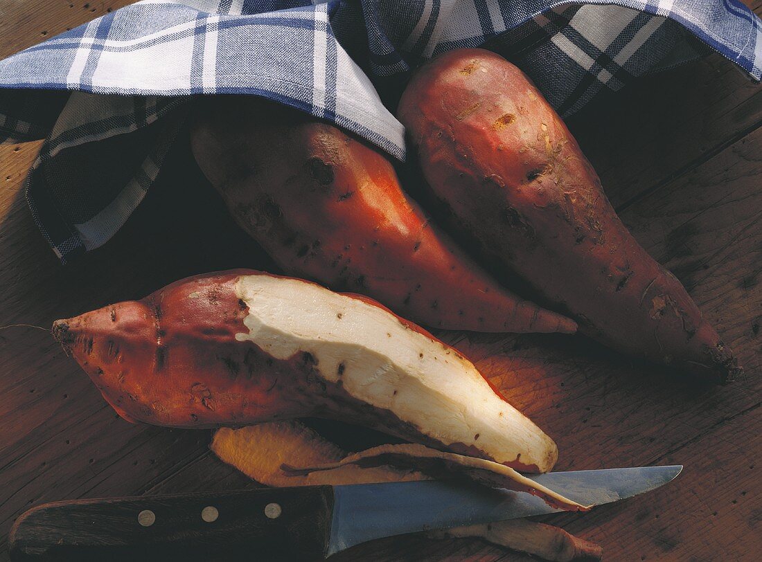 Sweet potatoes, some peeled