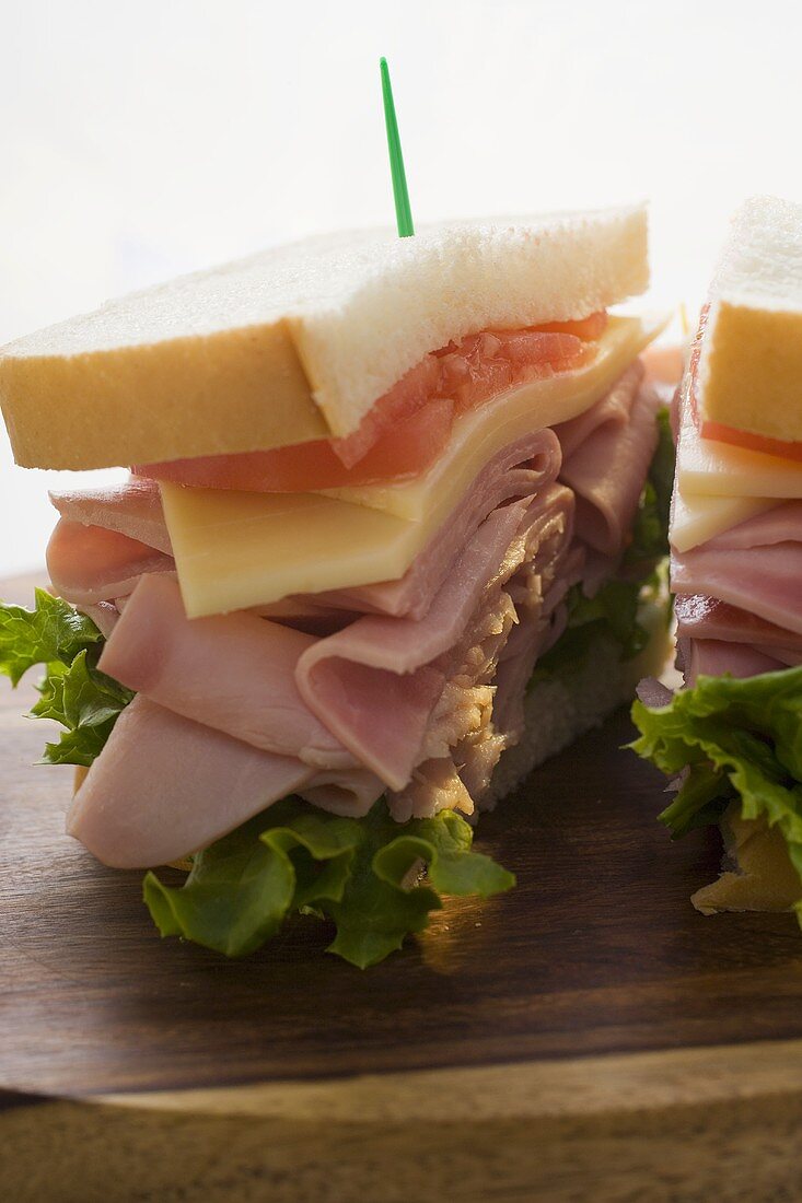 Ham, cheese and tomato sandwich (halved)