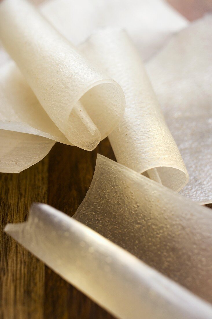 Rice noodles on wooden background