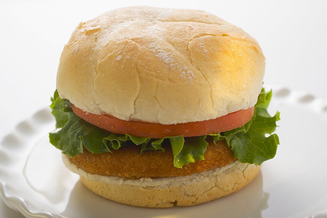 Chicken burger with tomato and lettuce