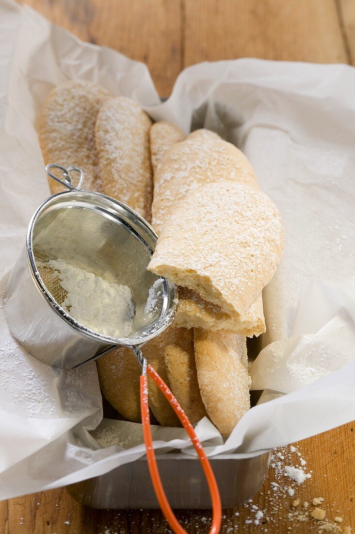 Sponge fingers with icing sugar