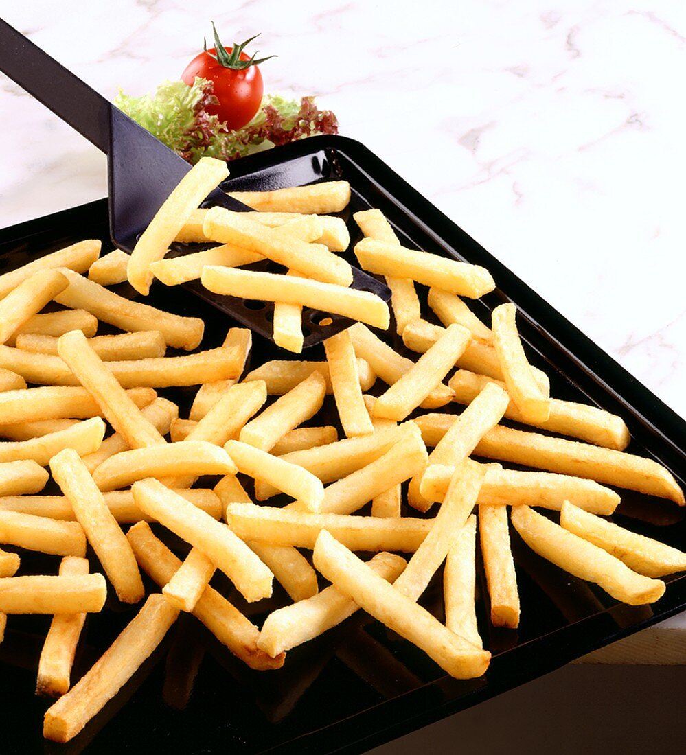 Chips on a baking tray