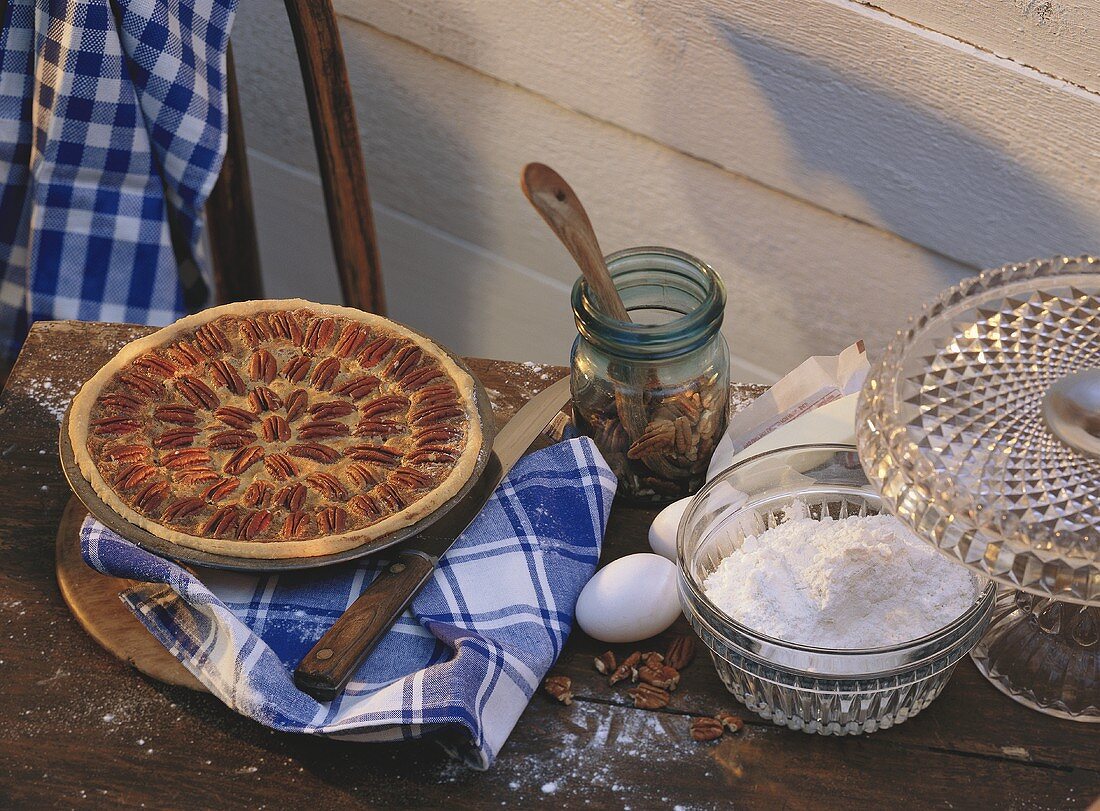 Pecan pie & ingredients on table