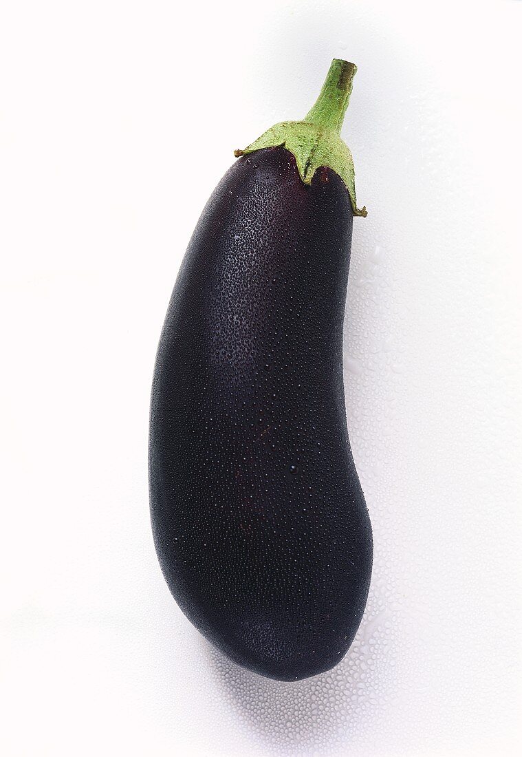 Aubergine with drops of water