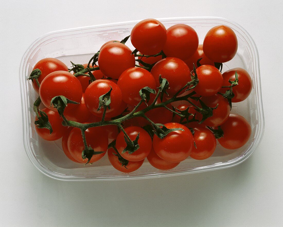 Cherry tomatoes in plastic punnet