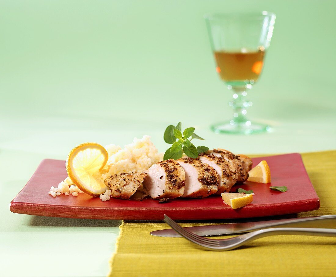 Chicken breast with herb crust and rice
