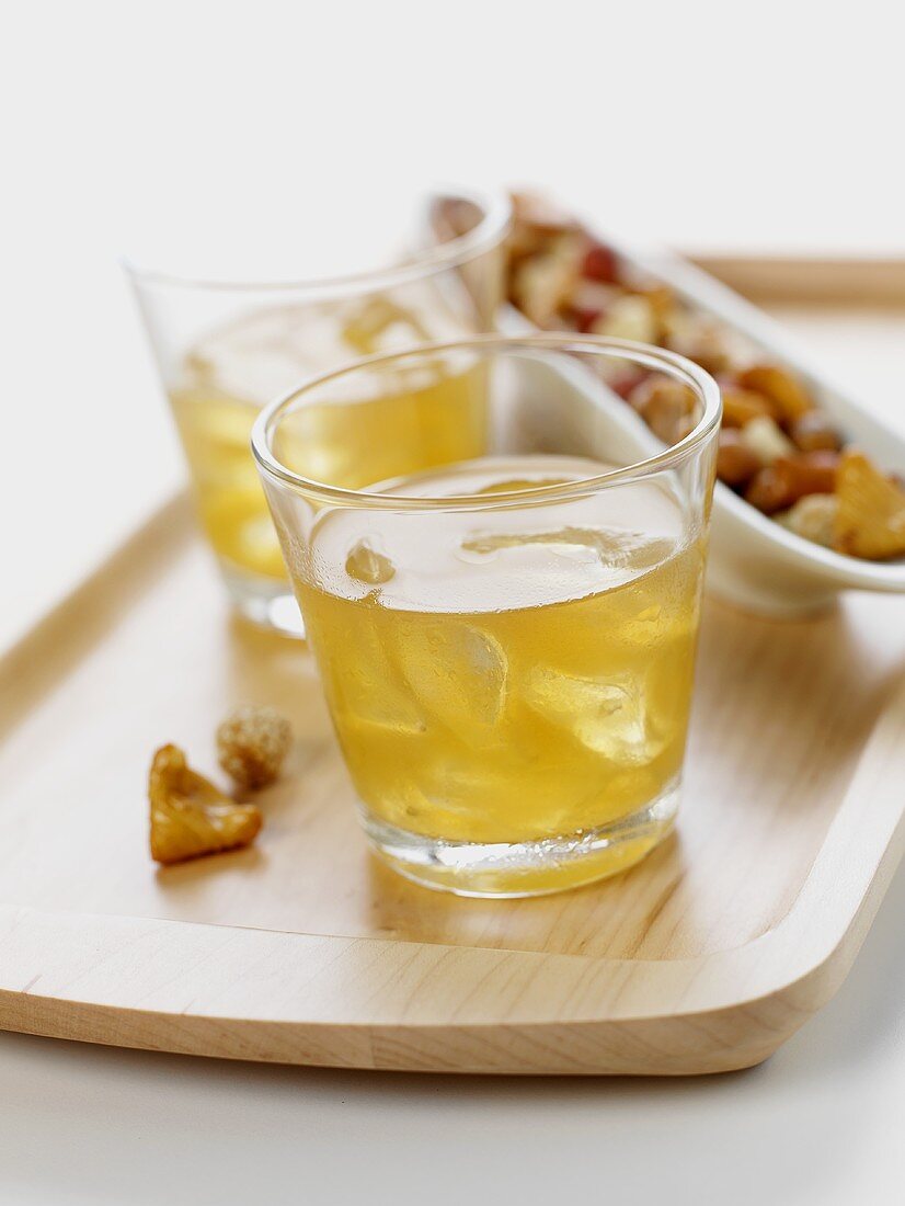 Two Brandy Sours with nibbles