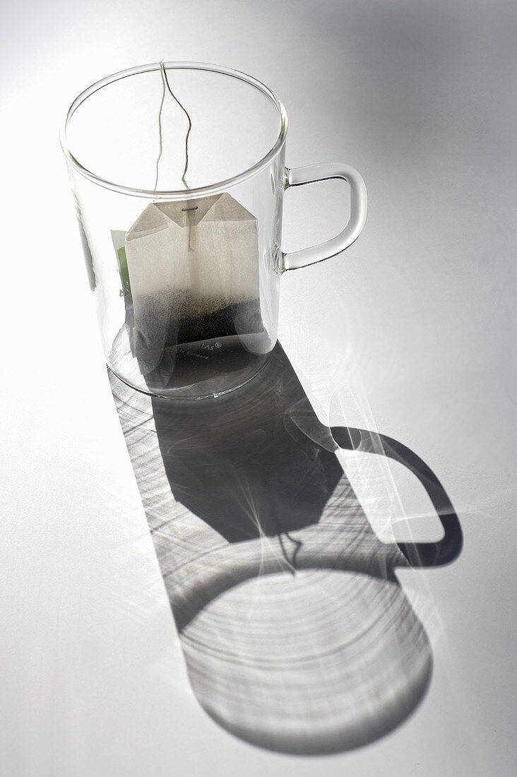 A tea bag in a tea glass