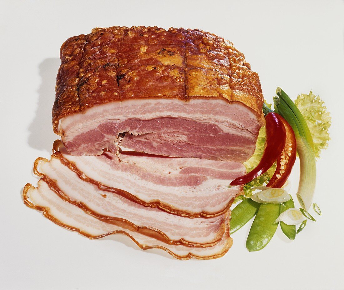 Cold baked ham, partly sliced