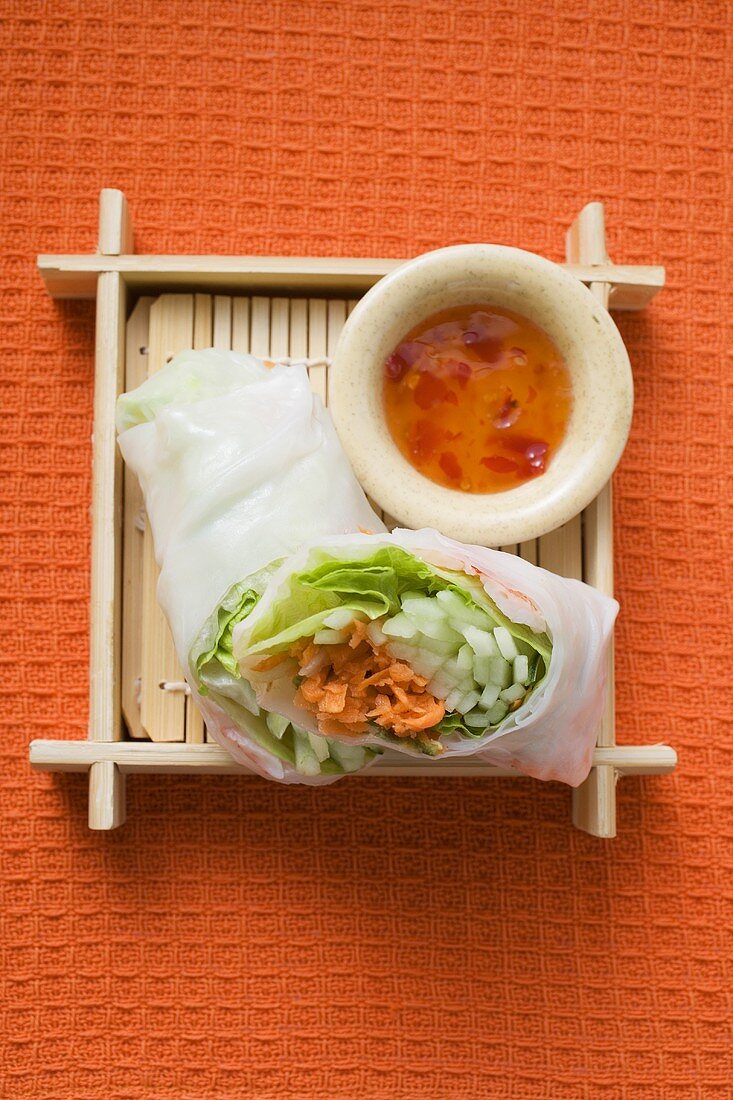 Vietnamese rice paper rolls with vegetables and spicy dip