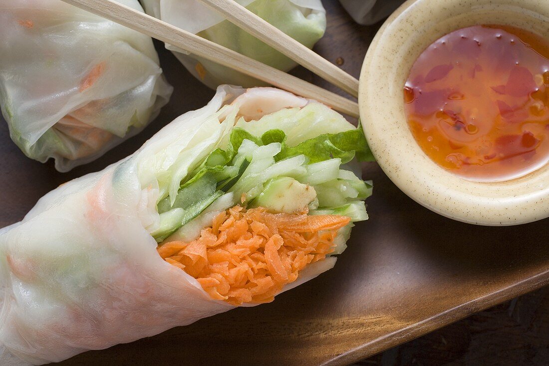 Vietnamese rice paper rolls with vegetables and spicy dip