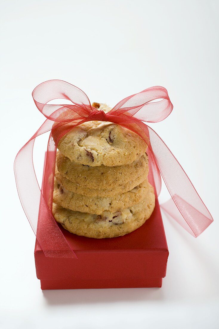 Biscuits with red bow on gift box
