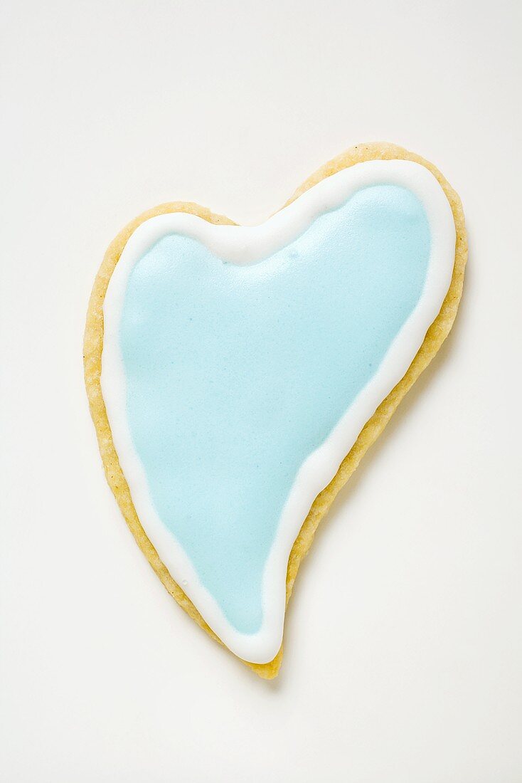 Heart-shaped biscuit with pale blue icing