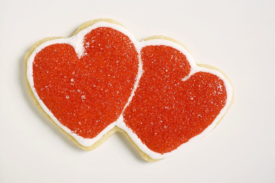 Double heart-shaped biscuit decorated with red sugar