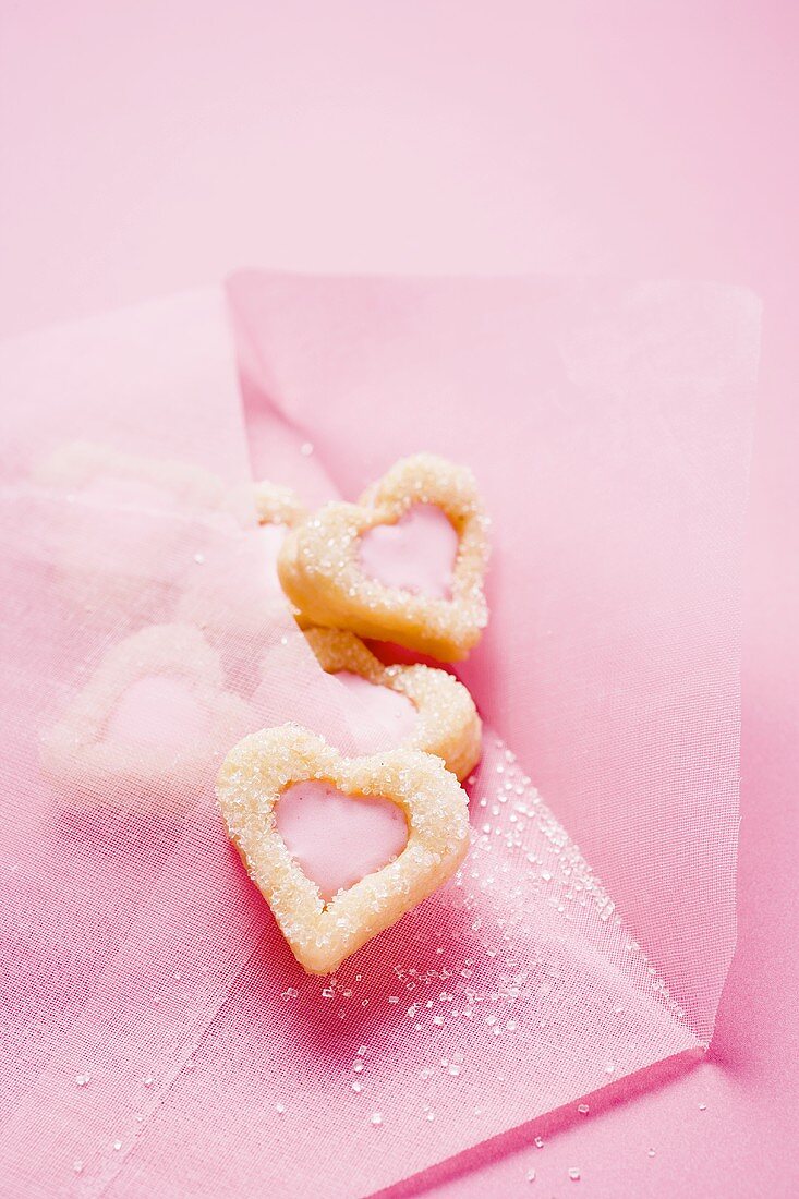 Pink envelope with heart-shaped biscuits