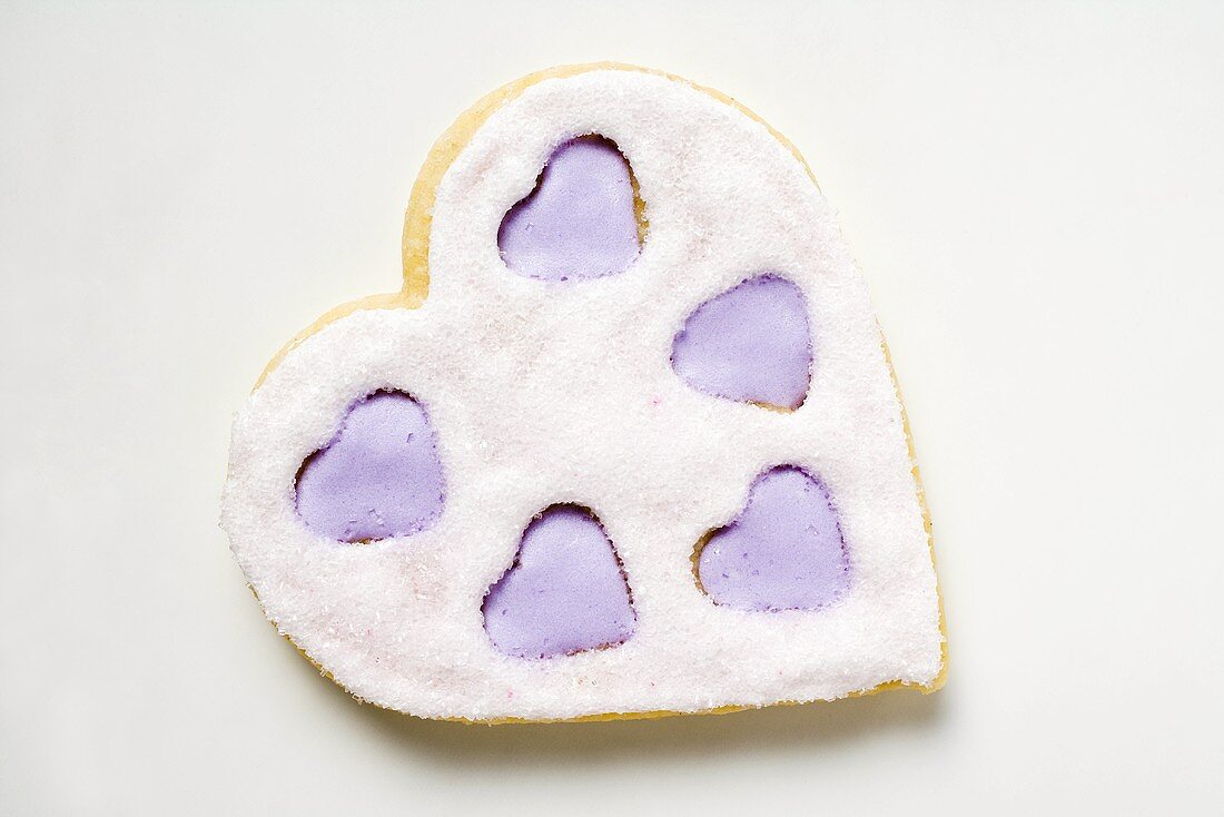 Heart-shaped biscuit with lilac and white icing