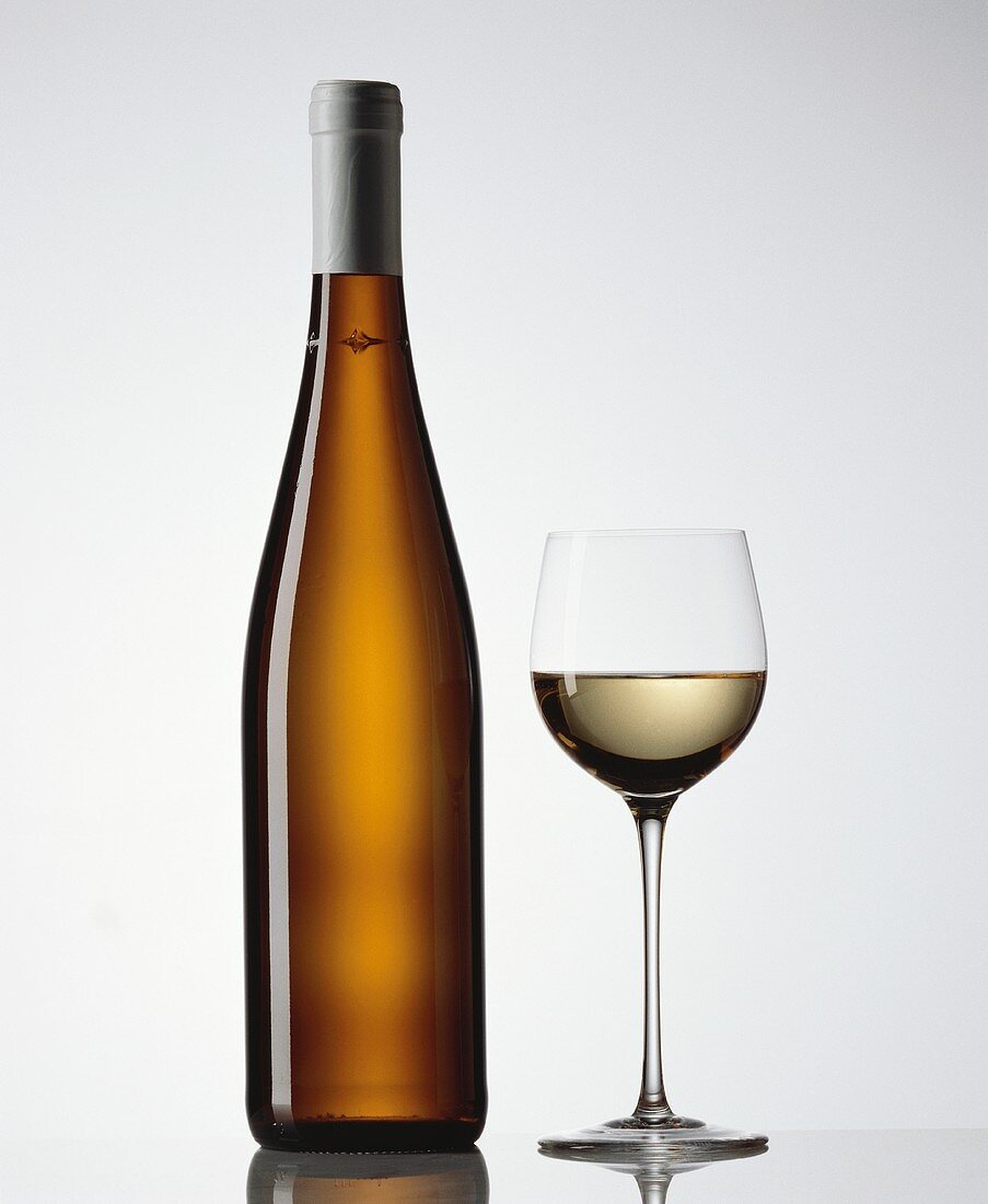 Glass and bottle of white wine