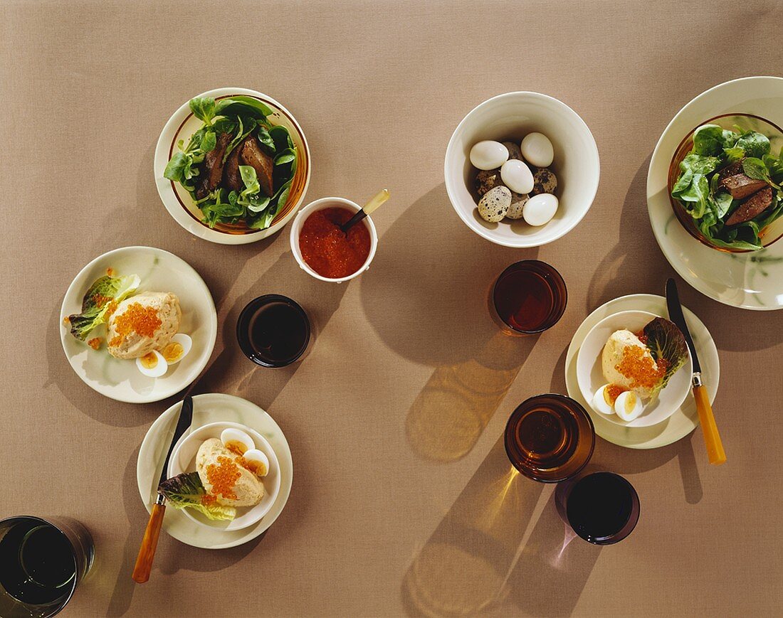 Corn salad with duck liver & salmon mousse with quails' eggs
