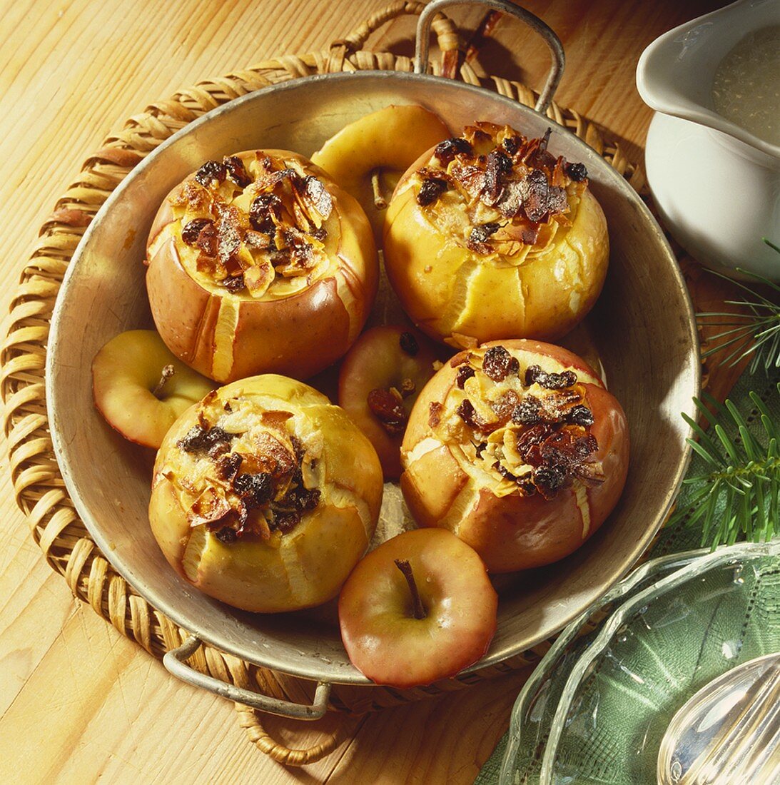 Four baked apples with raisin and almond stuffing
