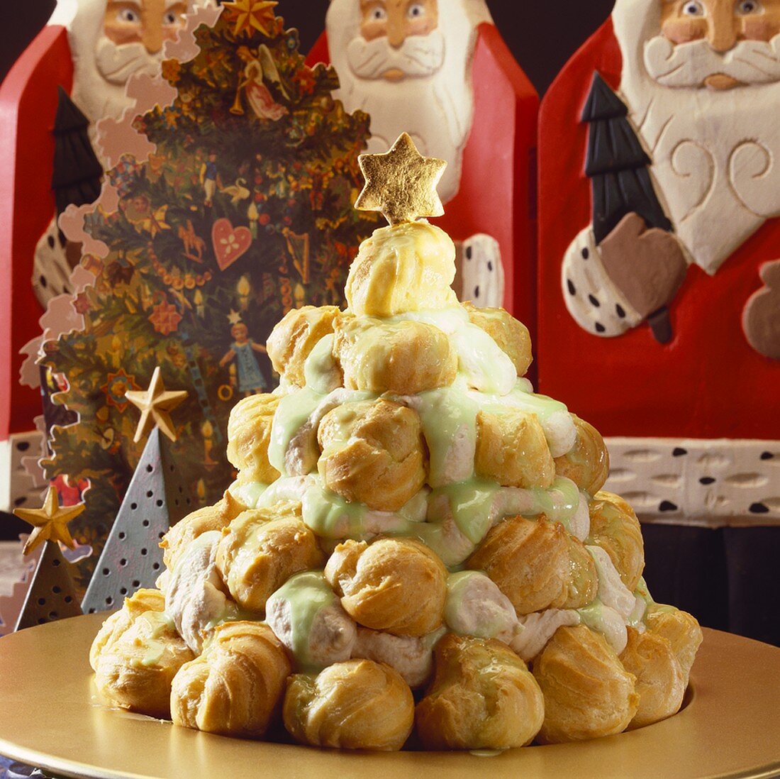 Pyramid of sweet profiteroles for Christmas