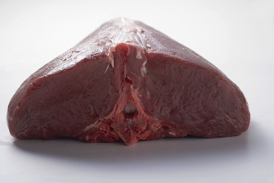 A piece of raw saddle of venison