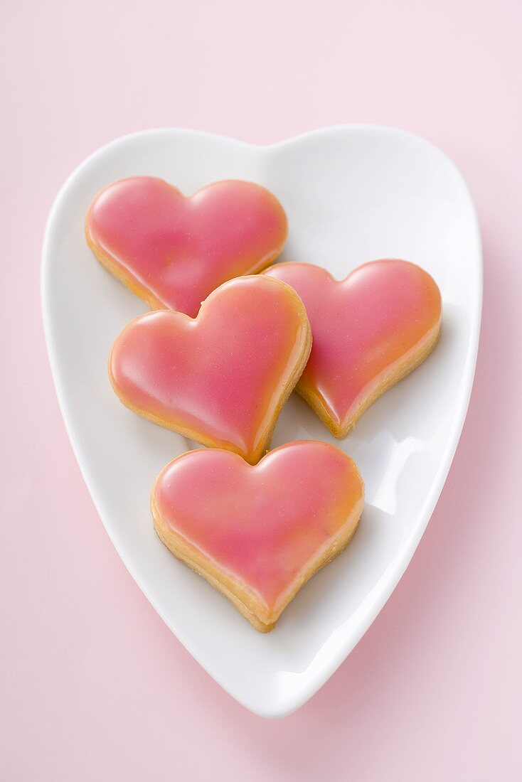 Heart-shaped biscuits (coloured background)