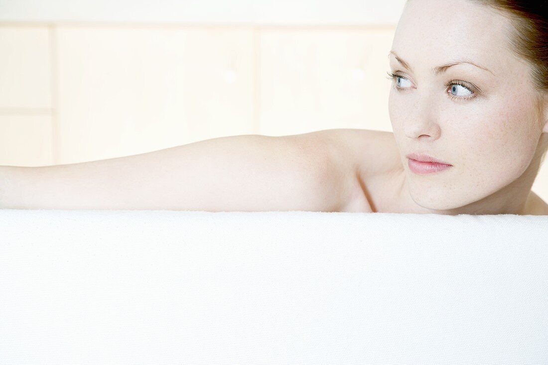 Young woman relaxing on a sofa