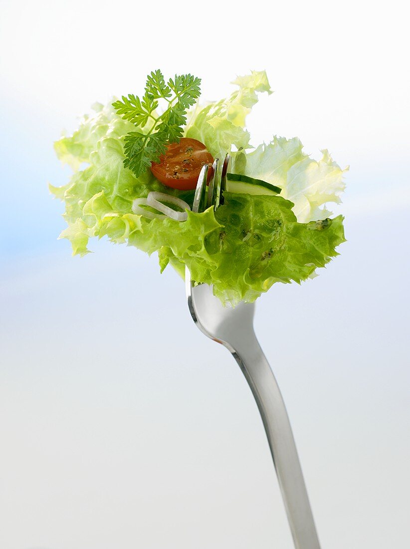 Salad on fork