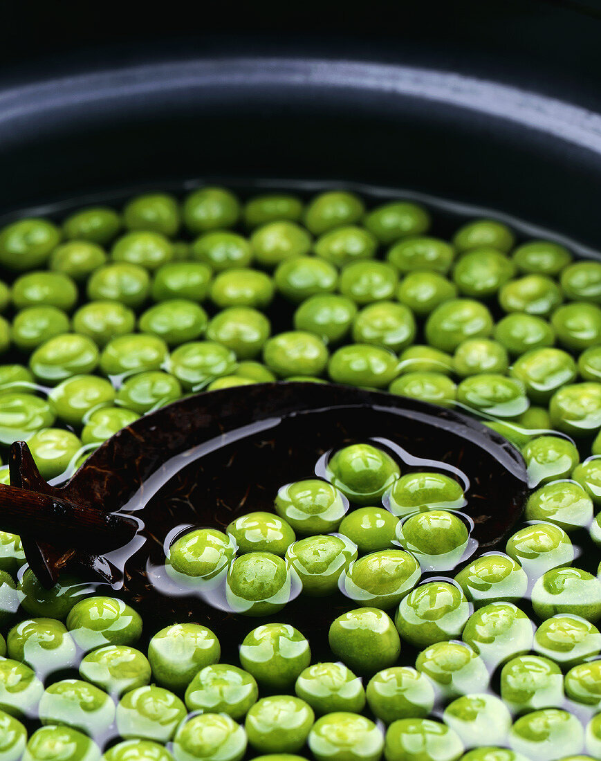 Peas in a bowl of water