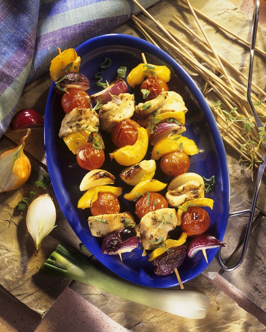 Grilled poultry and vegetable kebabs