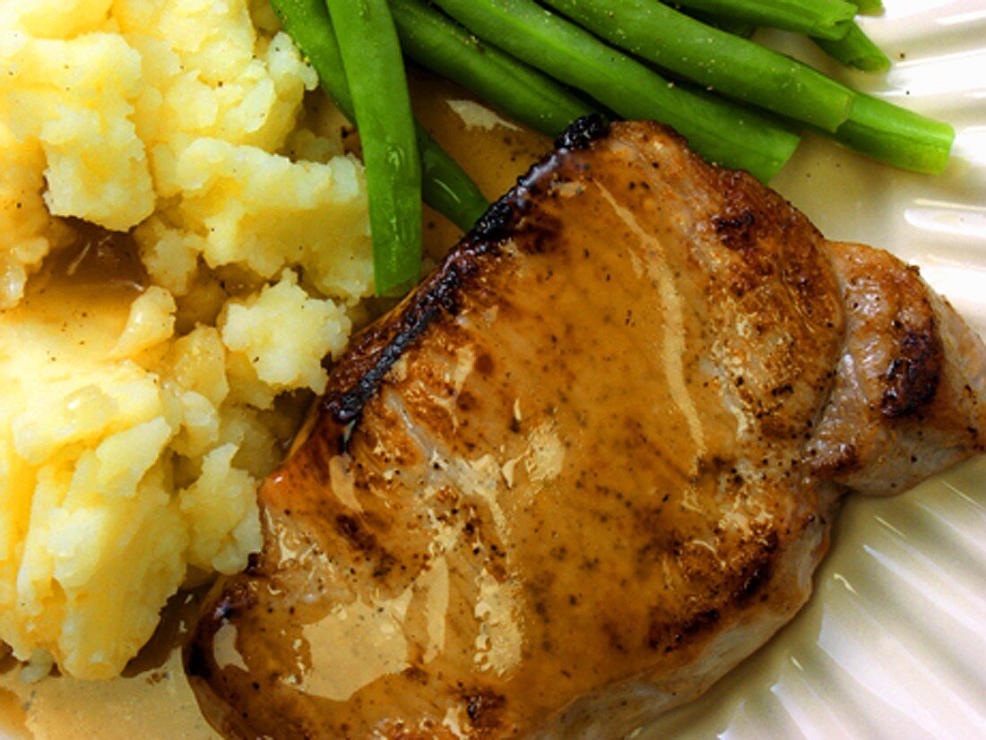 Boneless Pork Chop with Gravy and Mashed Potatoes