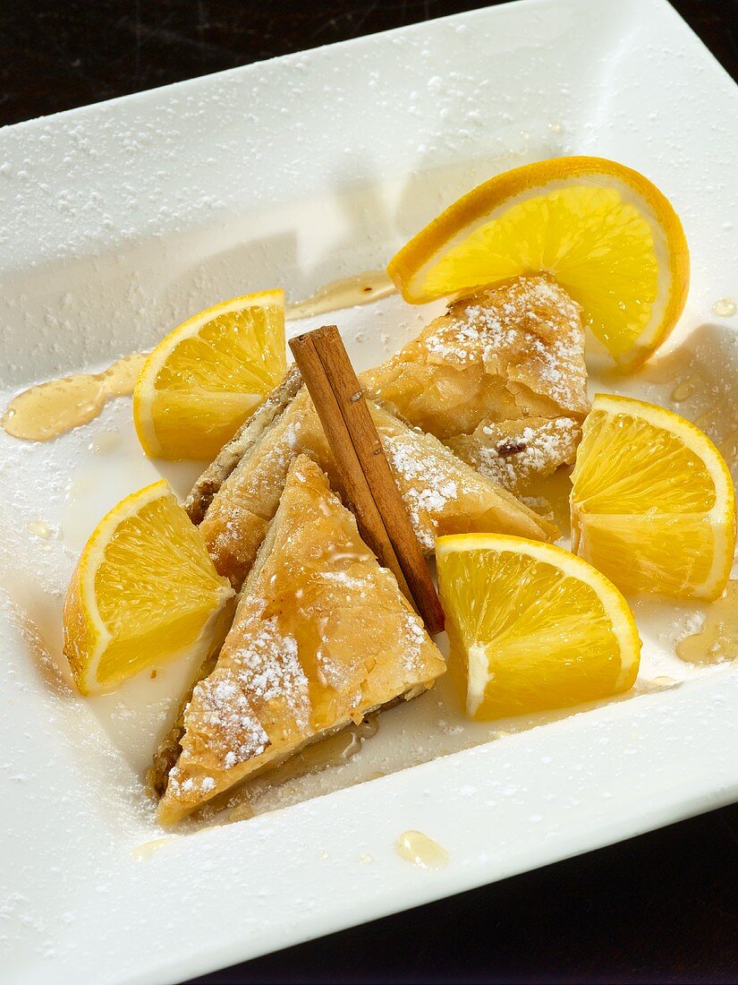 Baklava with Powdered Sugar, Orange, Honey and Cinnamon