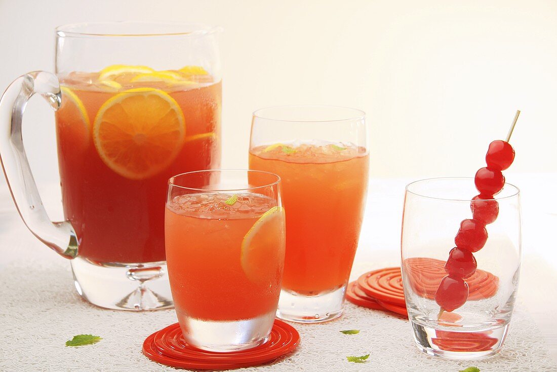 Fruit punch in glasses and a glass jug