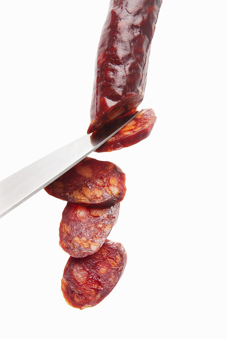 Chorizo being sliced