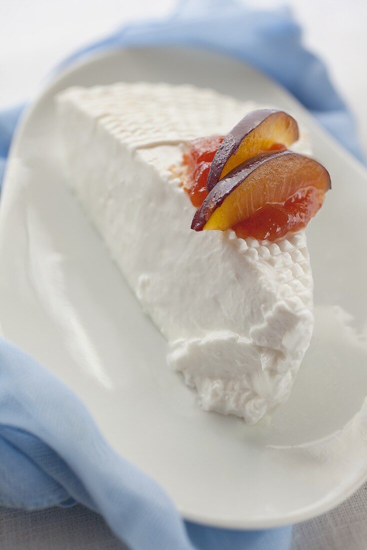 Cream cheese with sliced plums