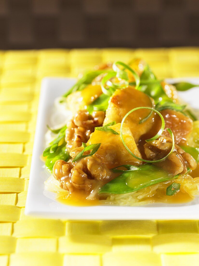 Sweet and sour tofu with mange tout