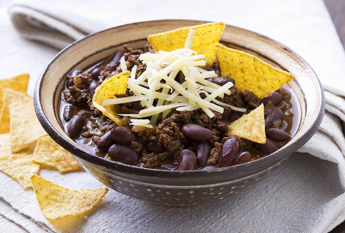 Chili con carne in cup with tortilla chips