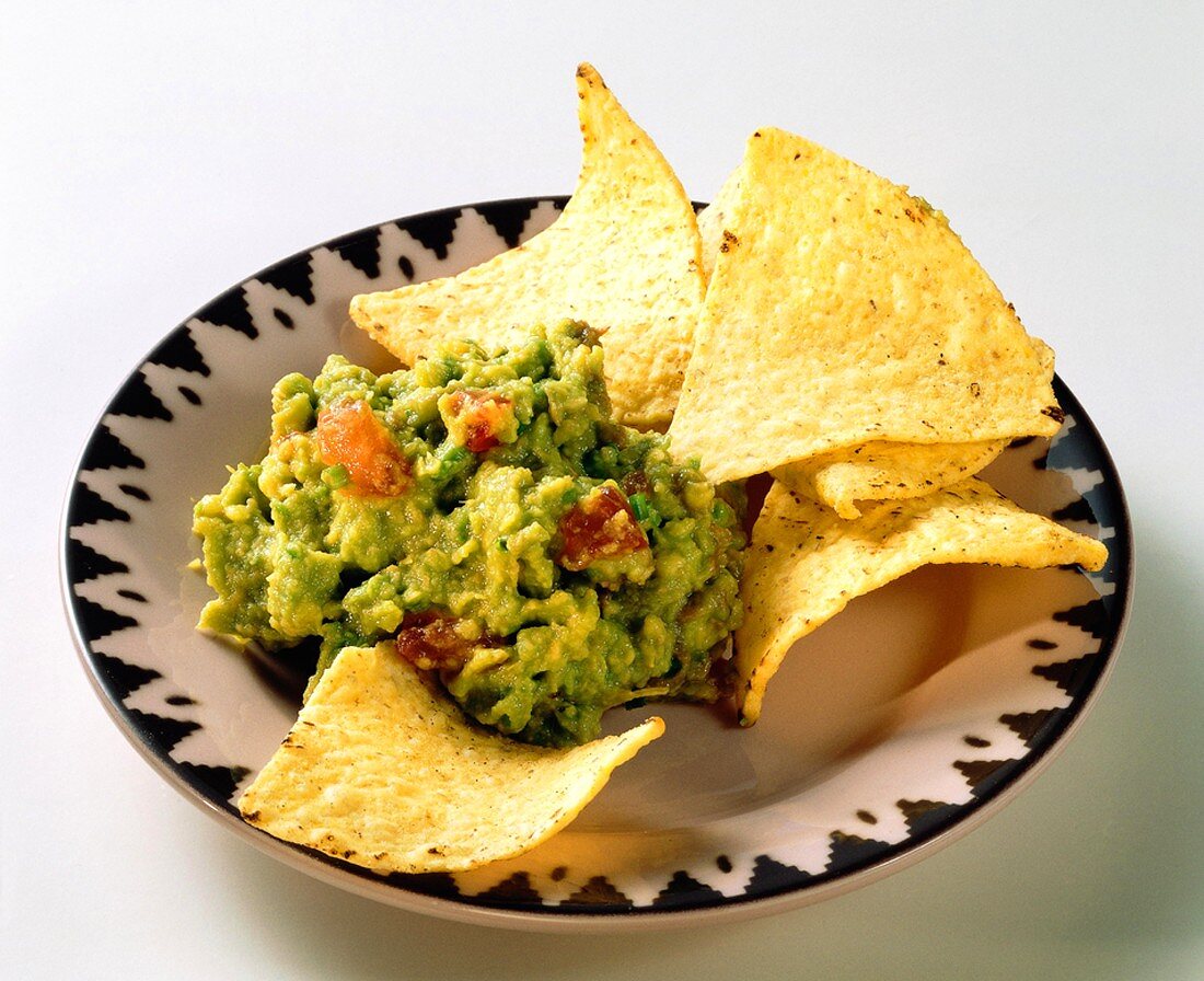 Tortilla Chips with Guacamole in a Bowl