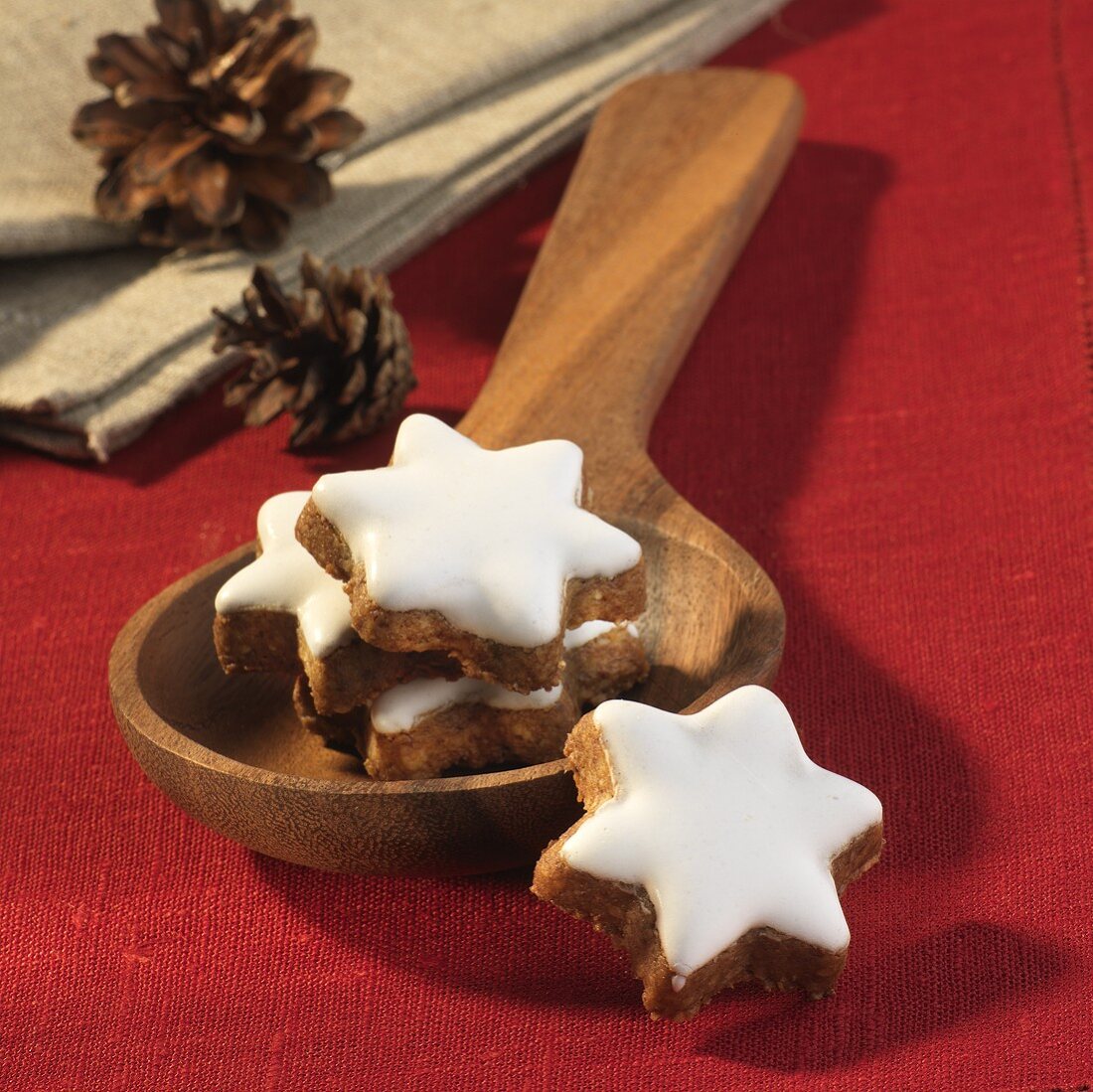 Cinnamon stars on a wooden spoon